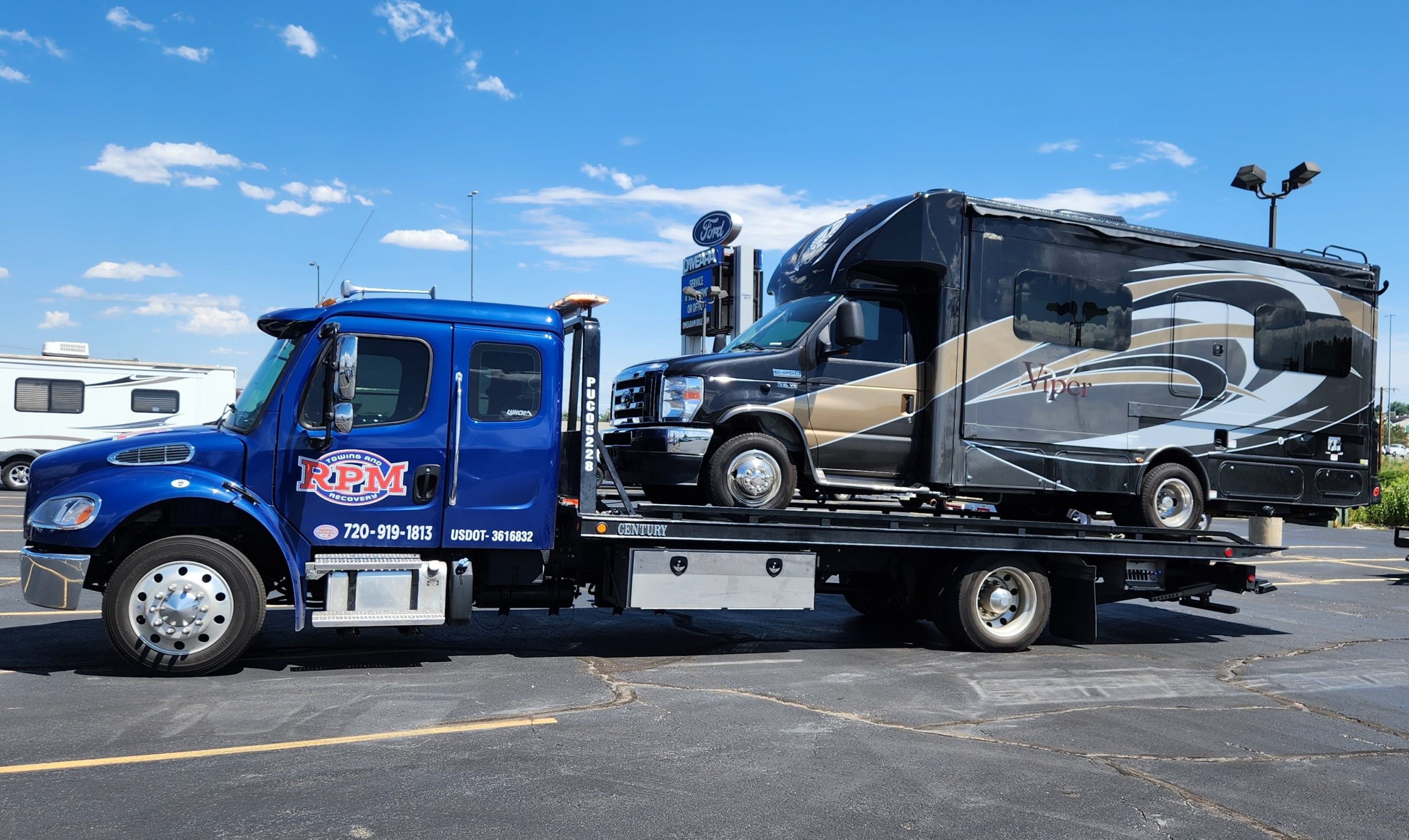 this image shows RV towing in Lakewood, CO